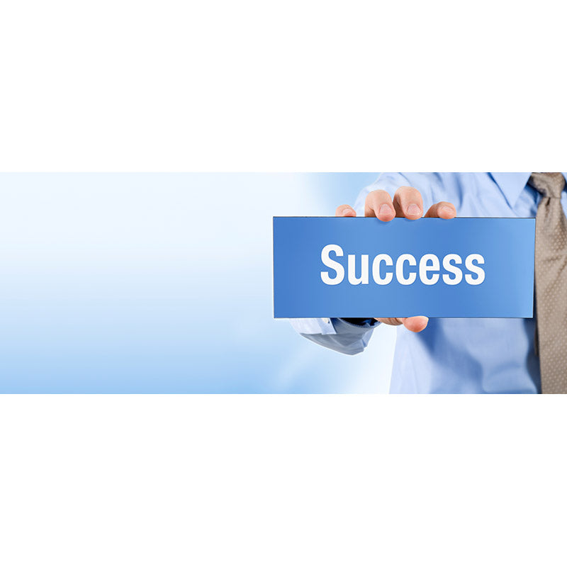 Businessman holding success sign banner stock photo