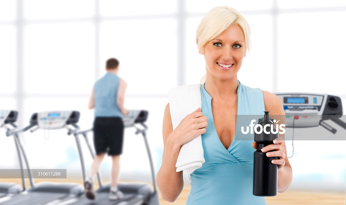 Fit happy woman at the gym stock photo