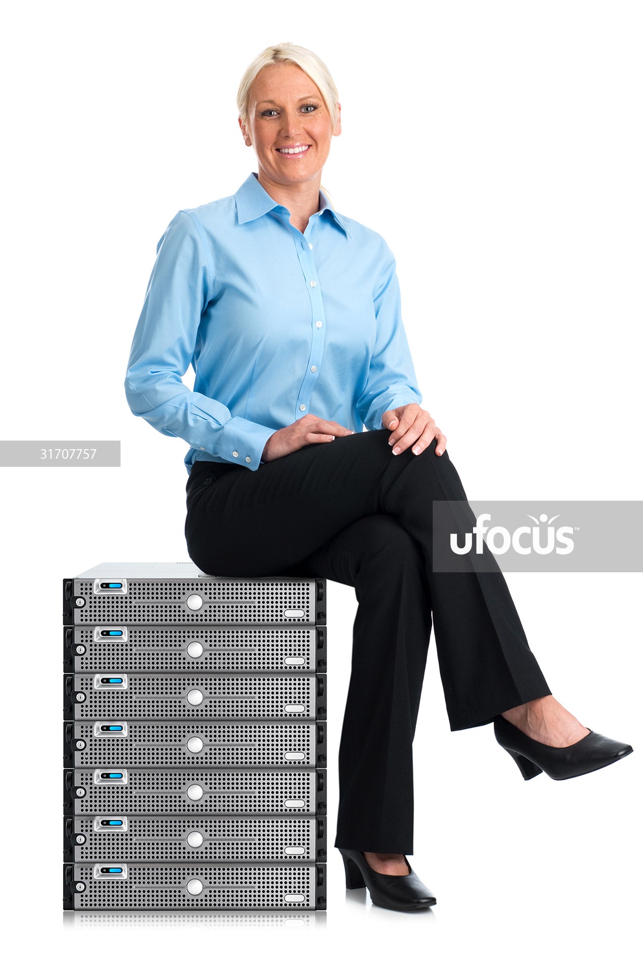 Business woman sitting on network servers stock photo