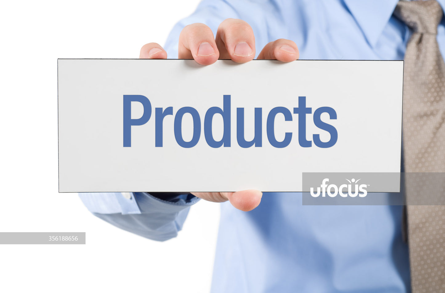 Businessman holding products sign stock photo