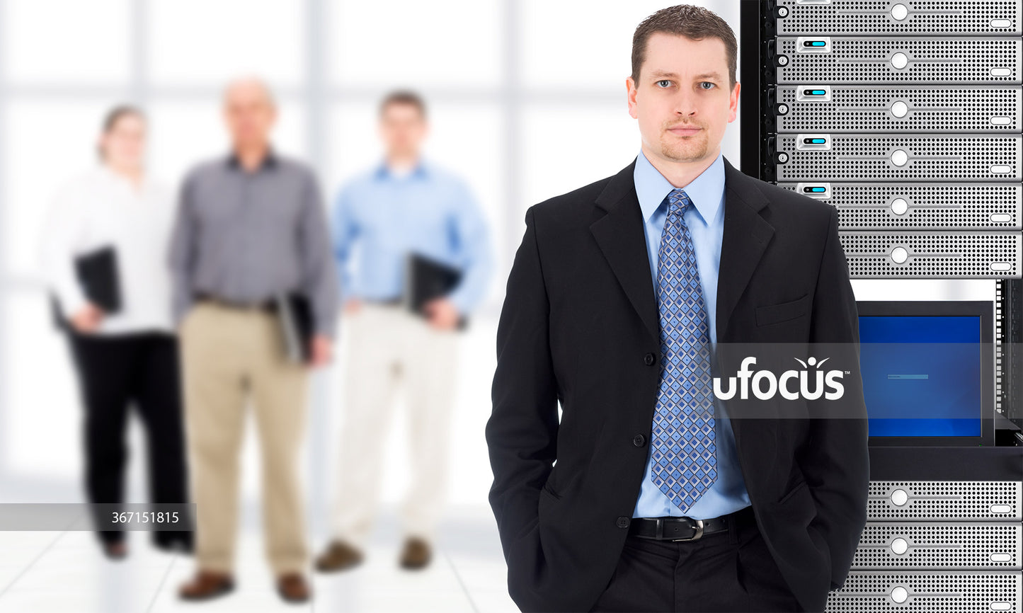 Businessman and IT support team stock photo