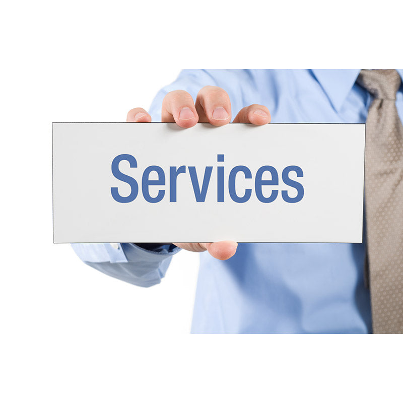 Businessman holding services sign stock photo