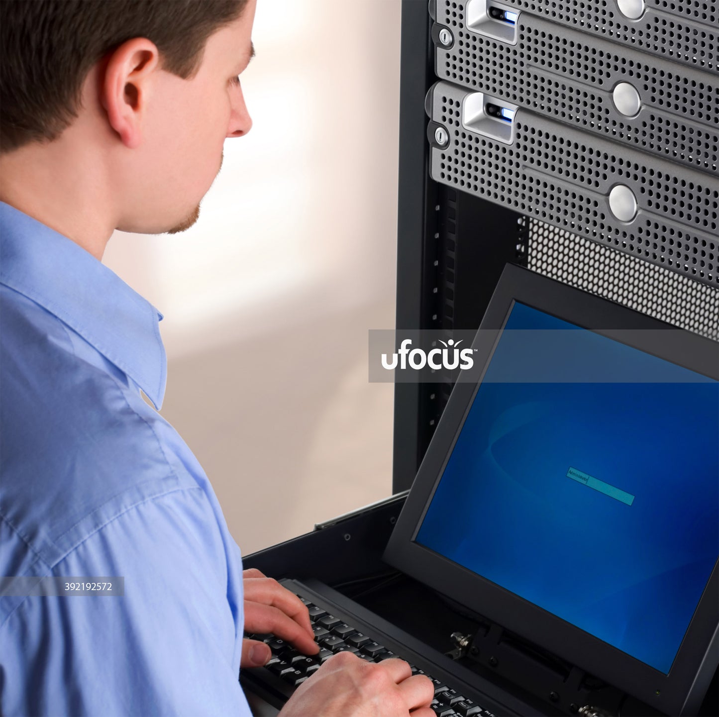 IT professional managing network servers stock photo