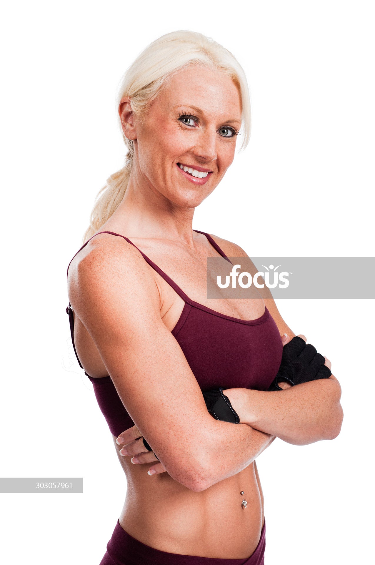 Beautiful female fitness trainer - fit woman stock photo