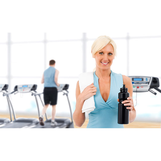 Fit happy woman at the gym stock photo