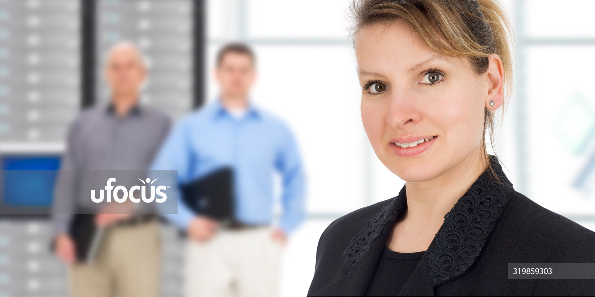 Businesswoman and IT support team stock photo