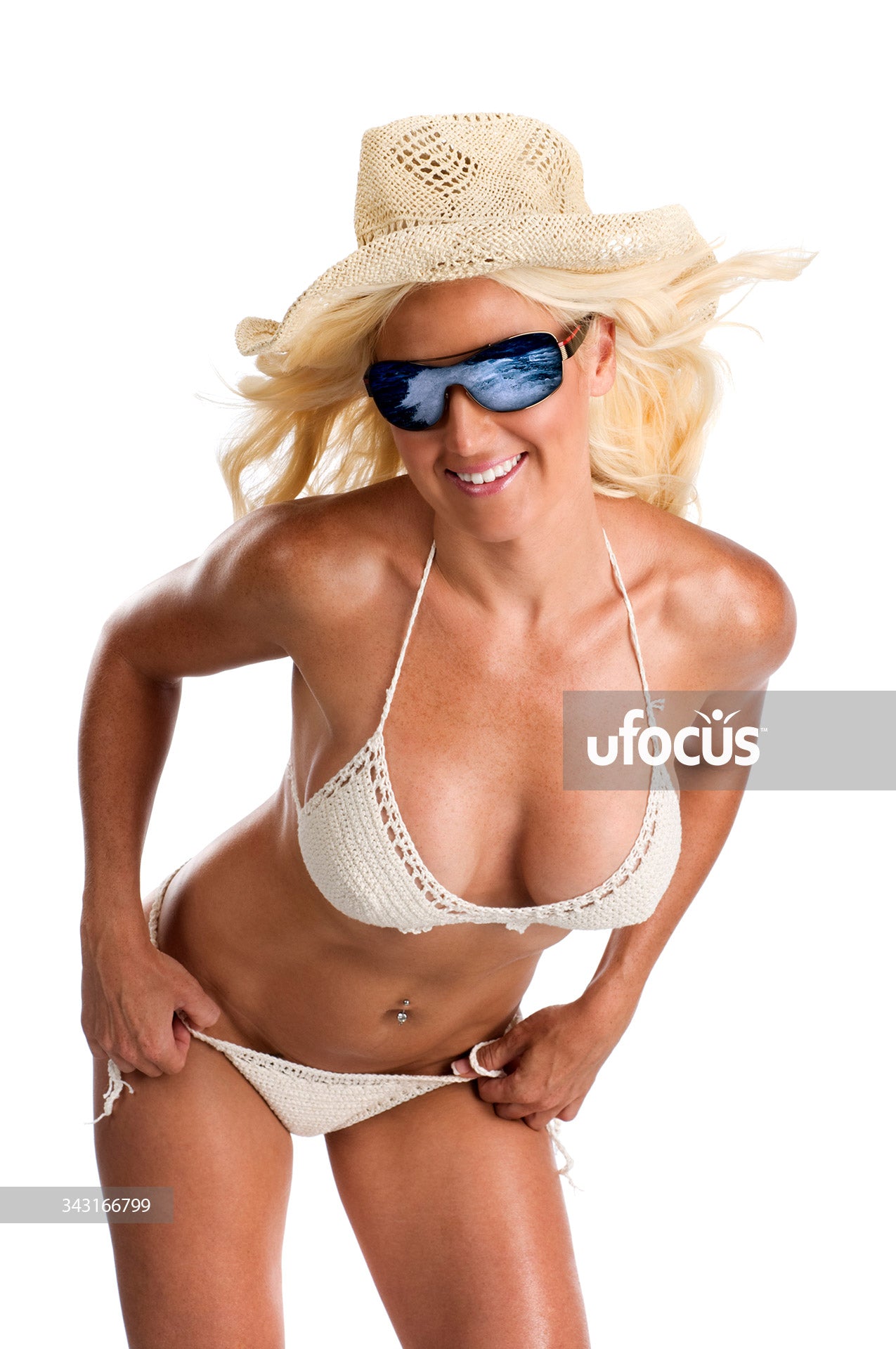 Happy smiling beach bikini fitness model stock photo
